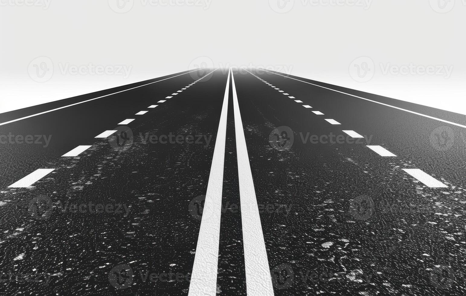 An empty road with white lines on it photo