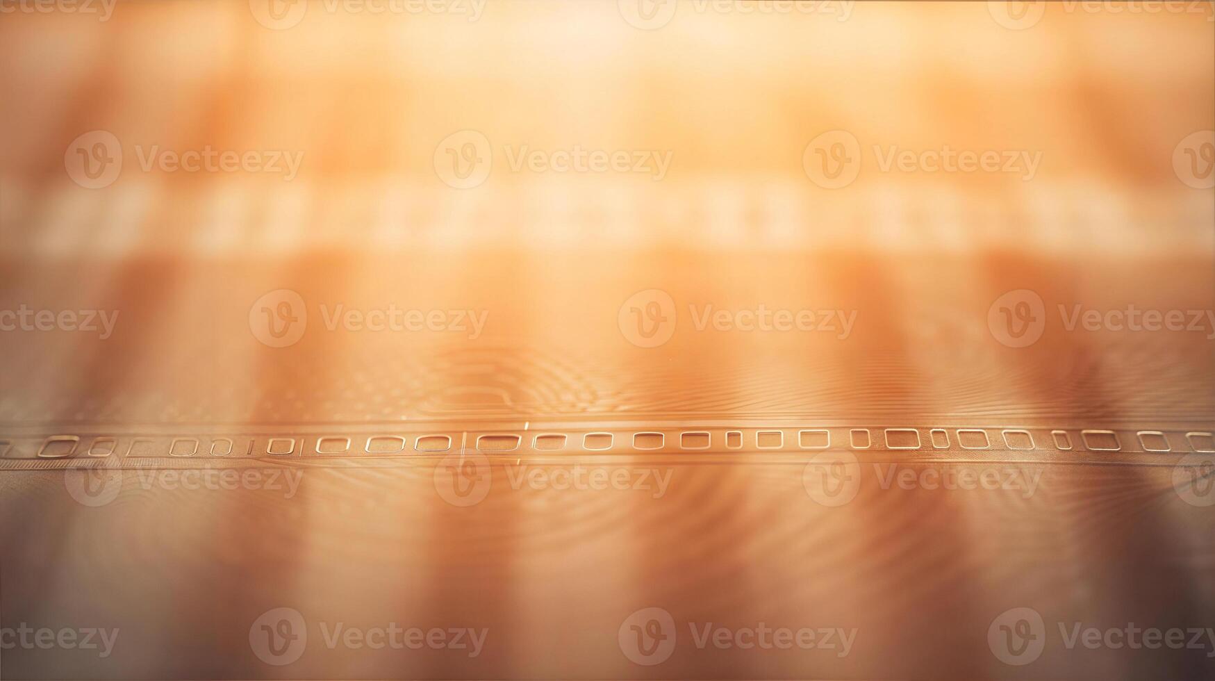 A close up of a circuit board with a light shining through photo