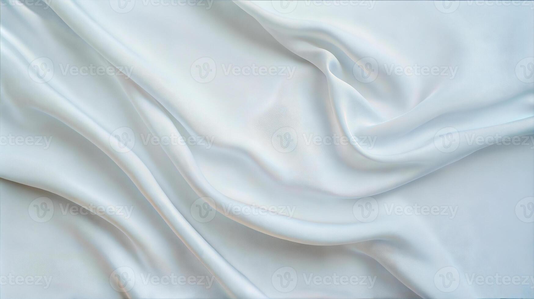 A white silk fabric with folds and folds photo