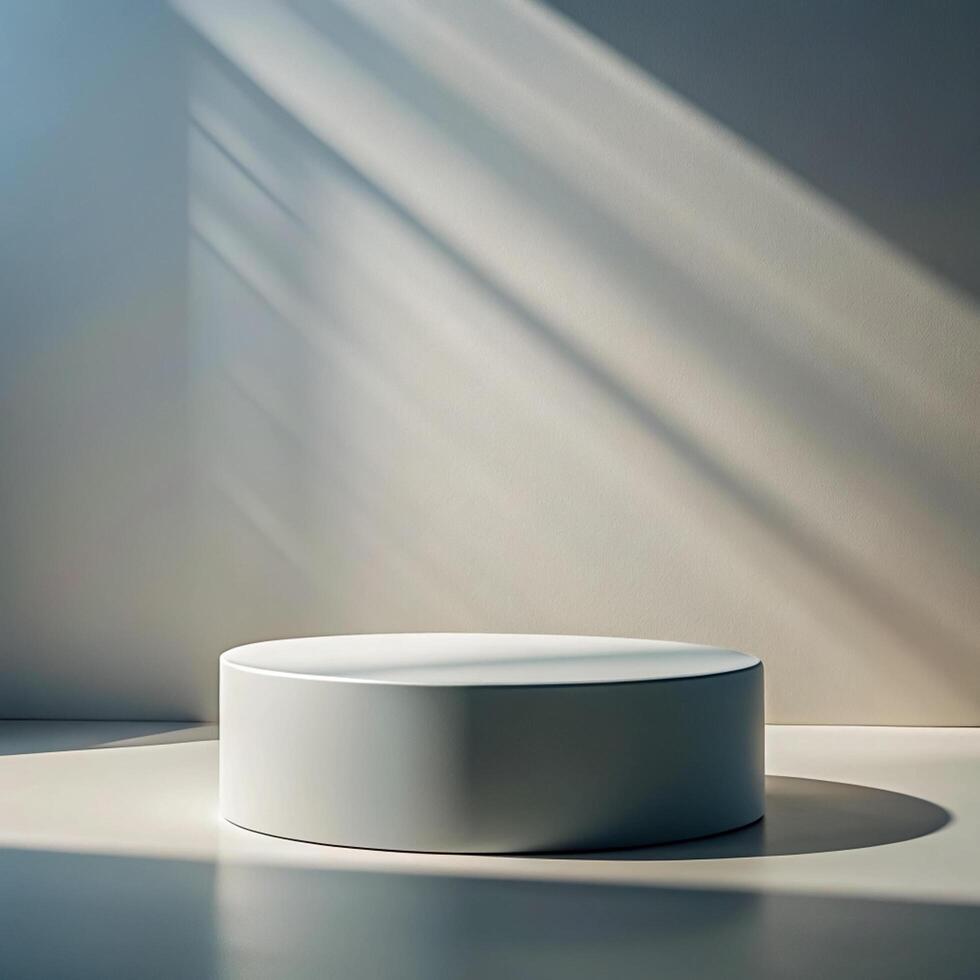 A white round table in front of a wall photo