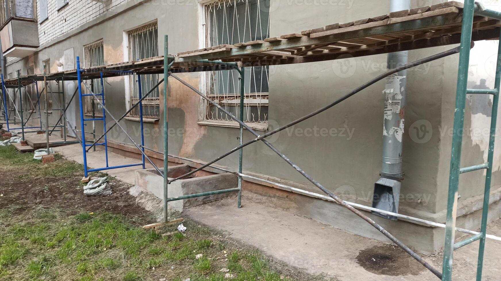 Scaffolding at the facade of the building . photo