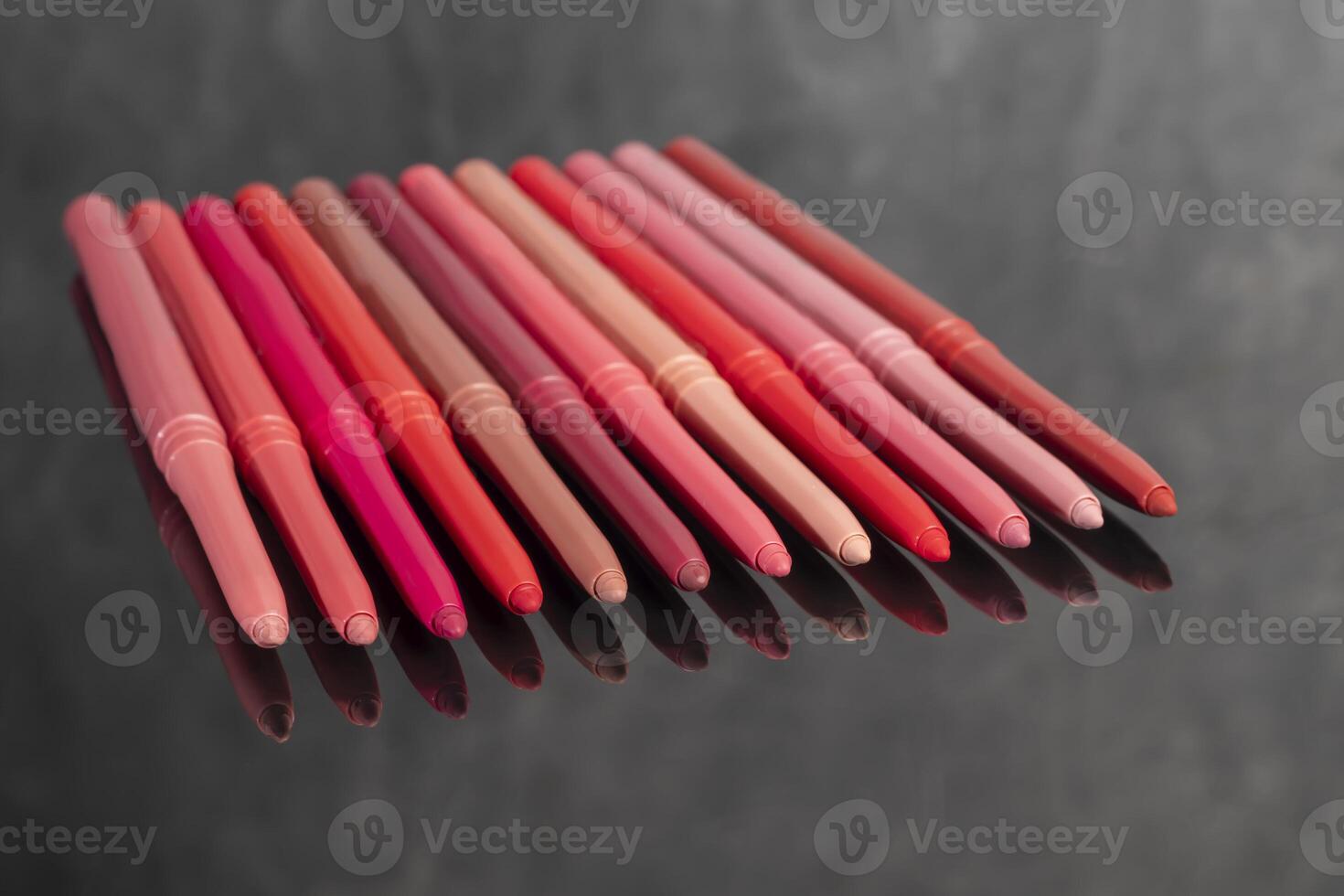 Differential pencils for lips and eyebrows close-up. Cosmetic product. photo