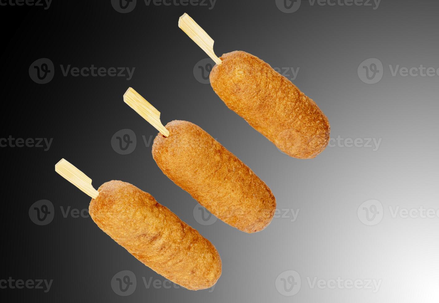 Corn dogs with different fillings and different sauces. isolated on background. photo