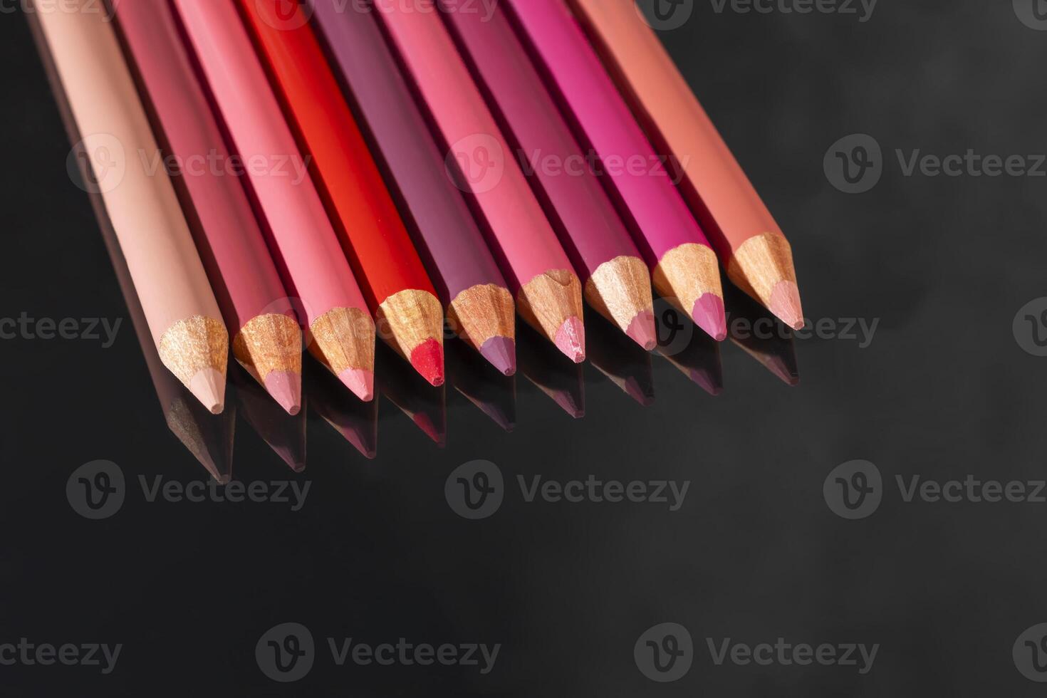Differential pencils for lips and eyebrows close-up. Cosmetic product. photo