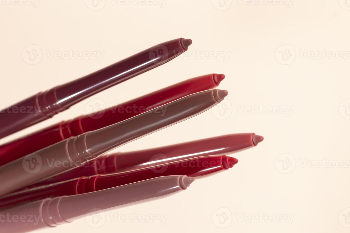 Differential pencils for lips and eyebrows close-up. Cosmetic product. photo