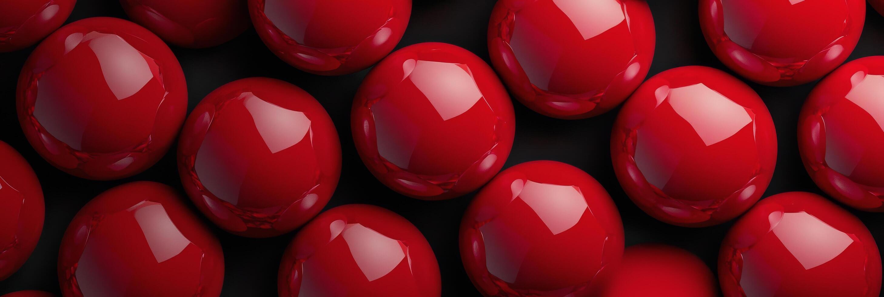 Close up view of shiny red balls arranged neatly on a flat surface during daylight photo