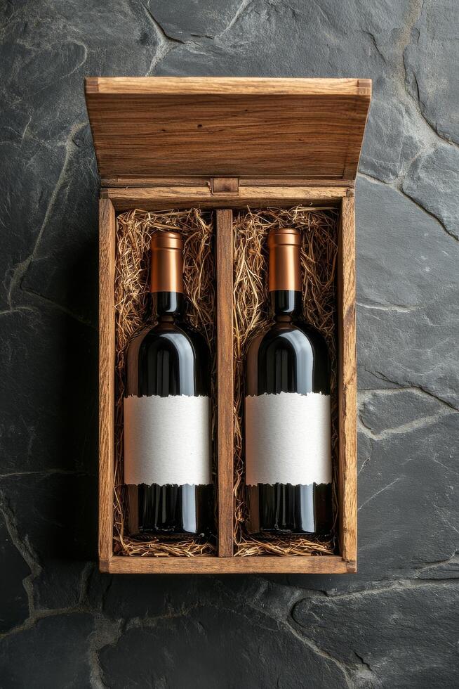 Elegant red wine bottles in a wooden box with straw, showcasing a rustic presentation for gifting photo
