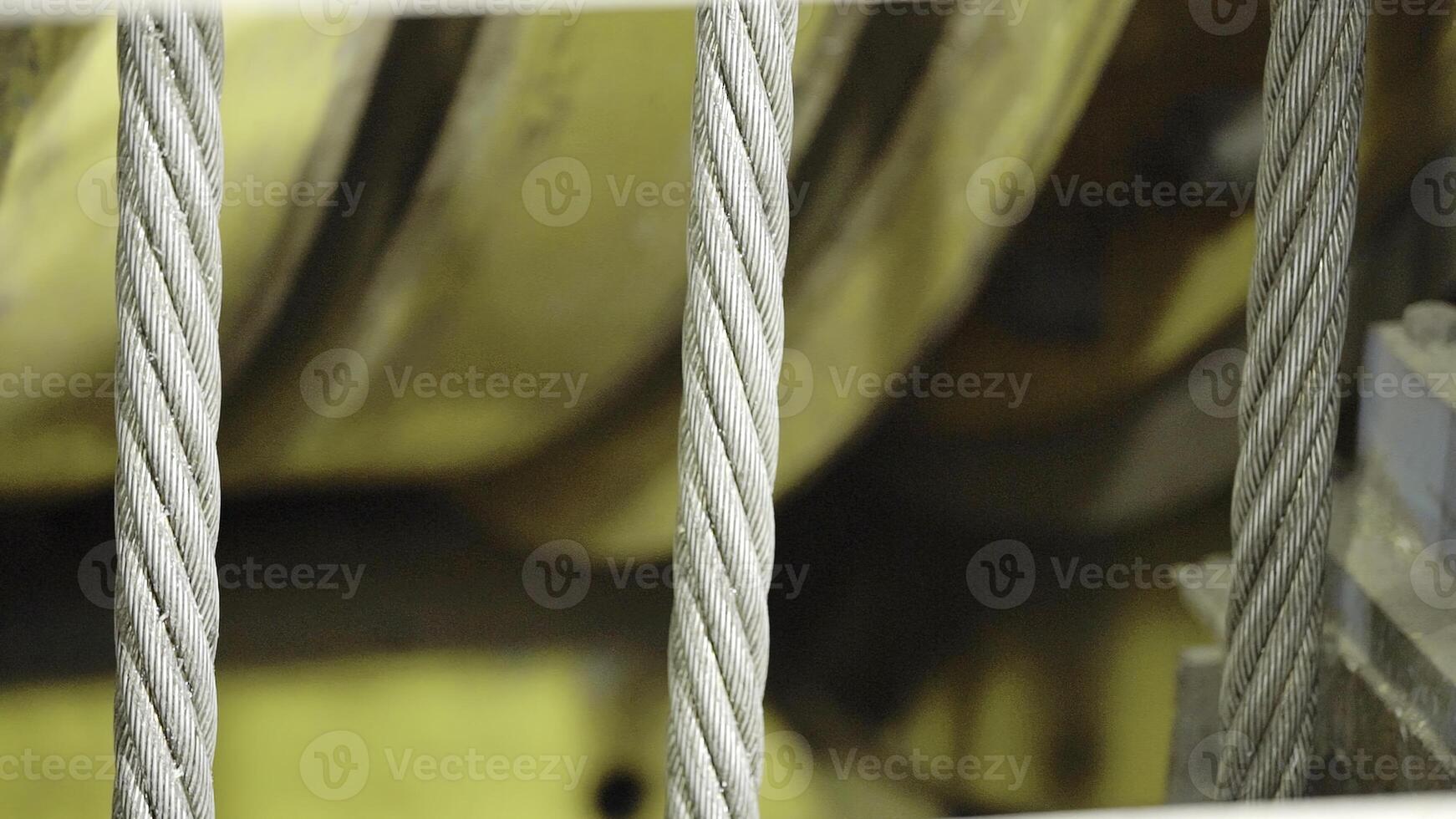 Industrial Machinery Featuring Ropes and Pulleys Actively Functioning in Various Applications. Stock Clip photo