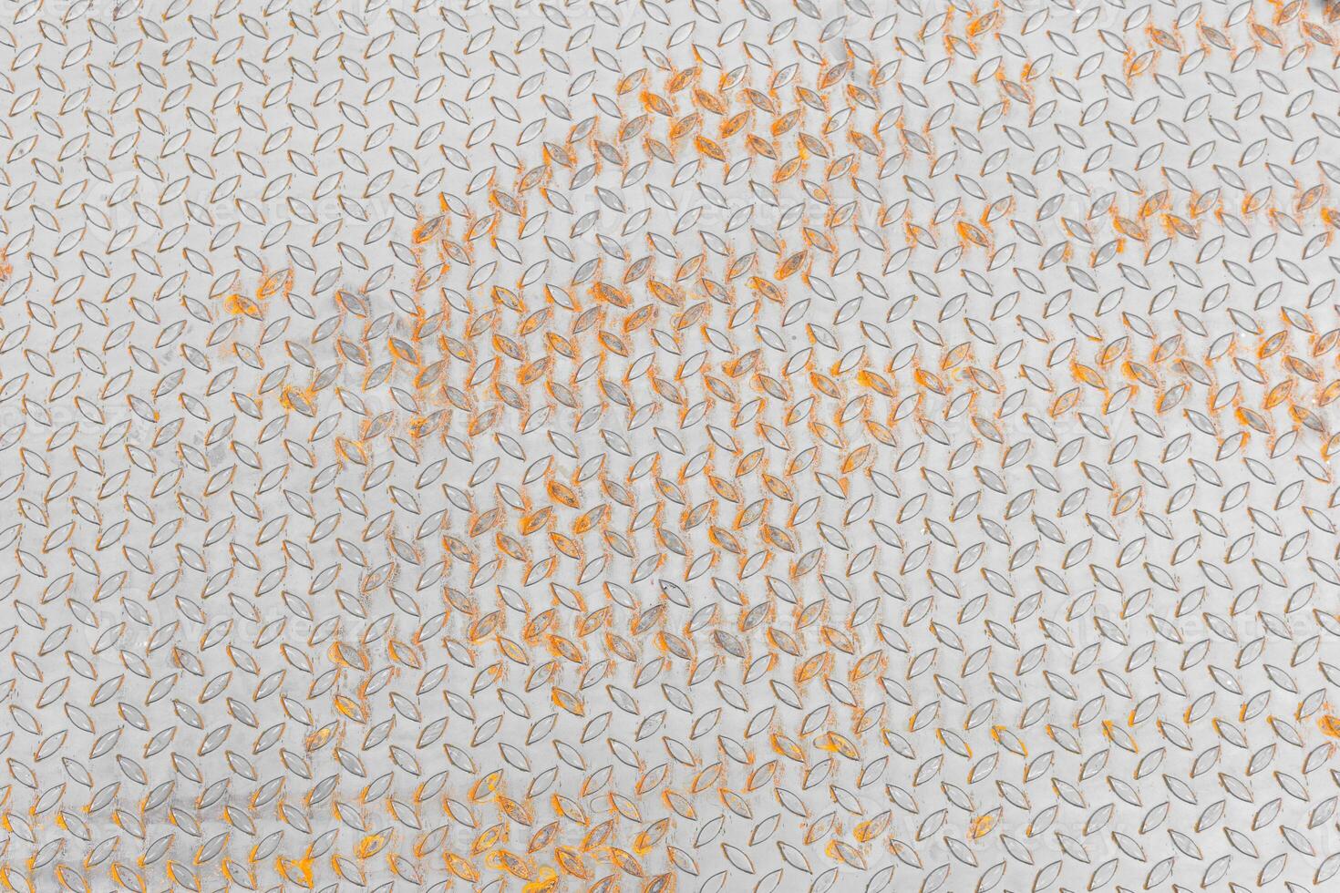 texture steel diamond plate pattern and rust photo