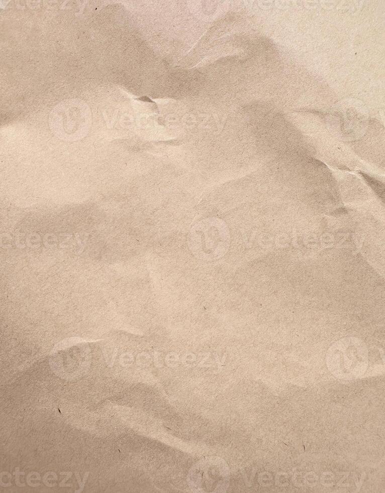 Brown Textured Crumpled Craft Paper Background photo