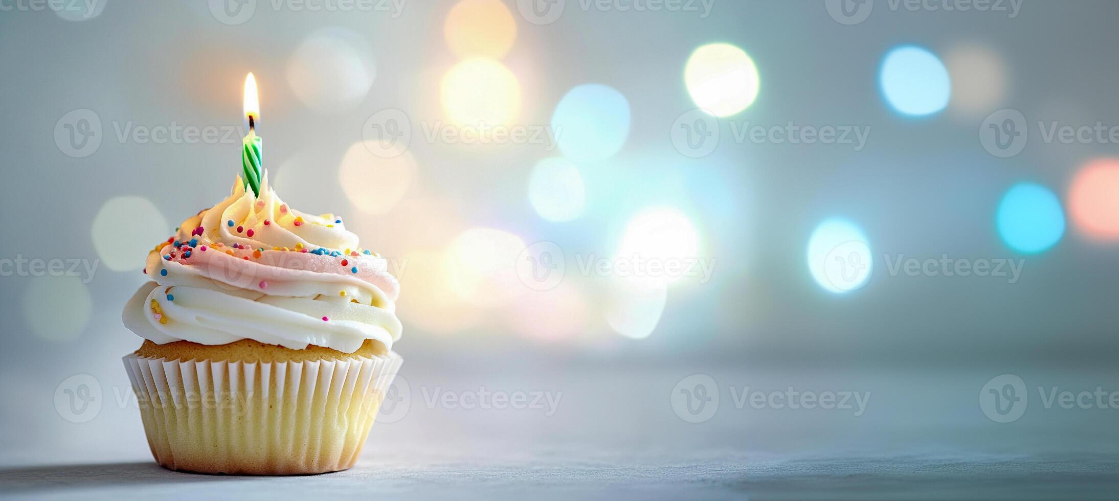Colorful birthday cupcake with candles on a light background, winner of a stock photo contest, in a minimalistic style, studio shot, with pastel colors, high-resolution photography, bokeh effect, blur