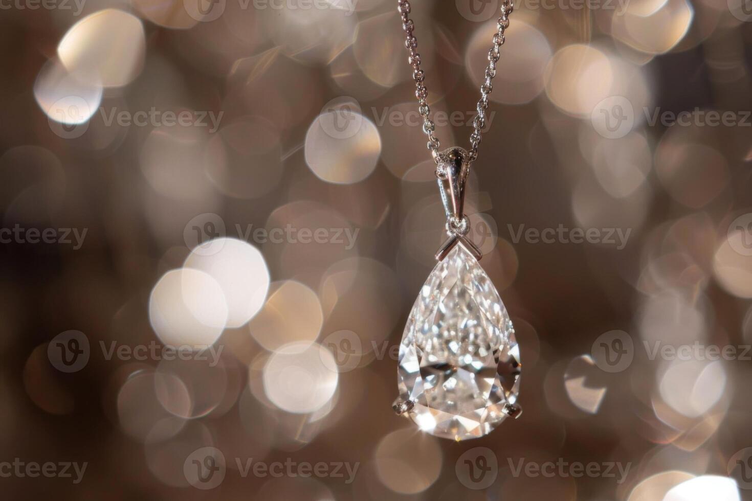 Elegant diamond pendant glimmering against a beautifully blurred background of soft lights photo