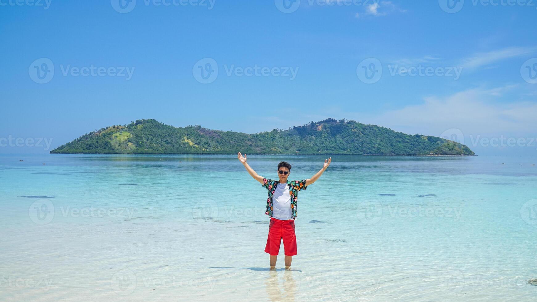 Man enjoying a tropical island paradise photo