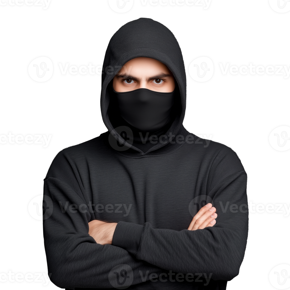 Man in a black hoodie with a face mask, arms crossed, isolated on a transparent background png