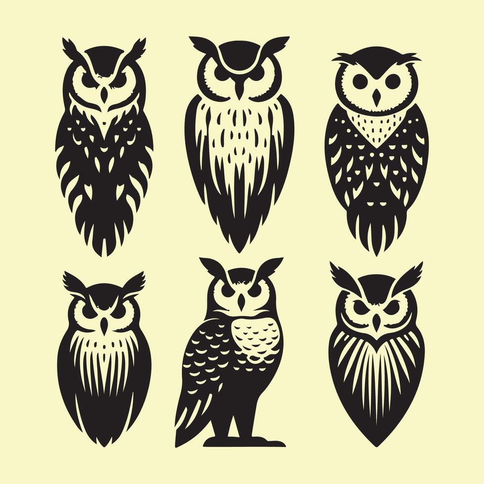 Set of owl silhouettes vector