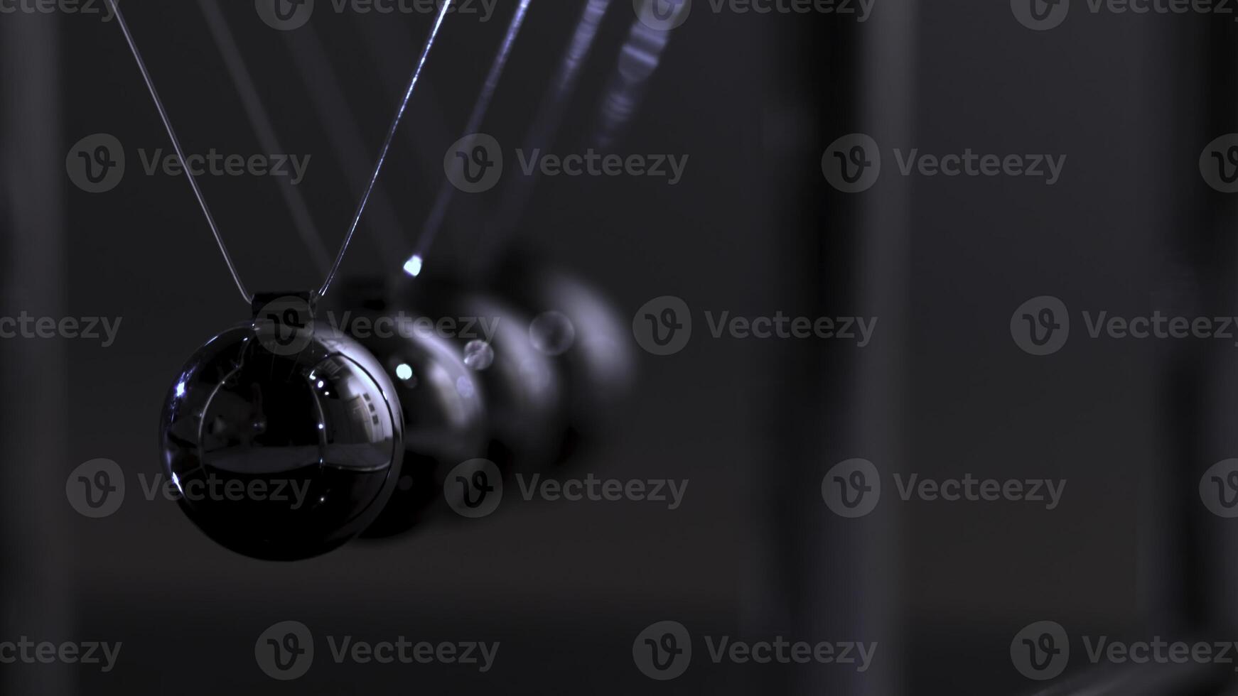 Newton's cradle physics concept for action and reaction or cause and effect. Balls Newton photo