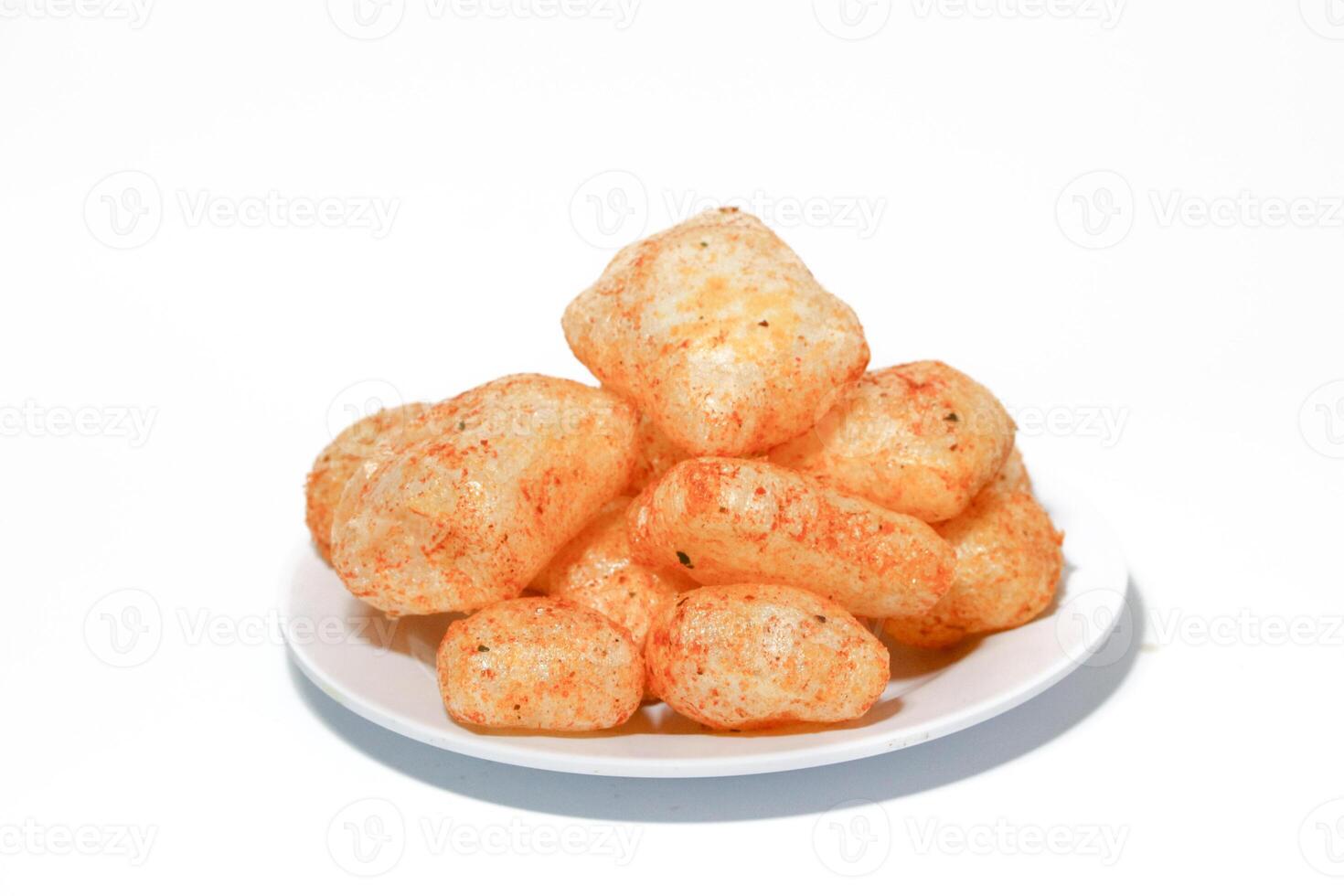 Kerupuk kulit,rambak, jangek, krecek, karodok, are a traditional Indonesian snack made from cow or sheep skin, with a spicy taste. photo