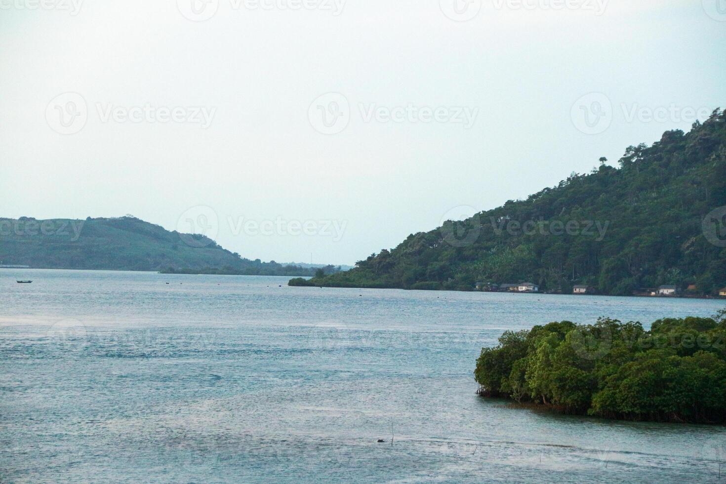 Landscape view between the sky and the vast sea, located at Sunda Strait, Lampung, Indonesia photo