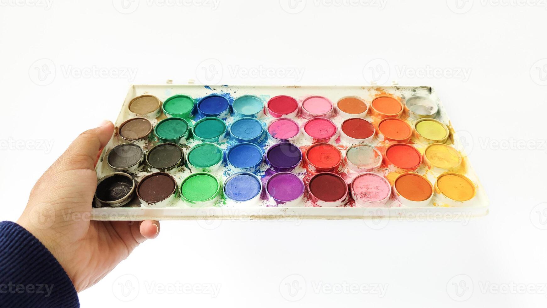 Set with strokes of colorful oil paints on white background, top view photo