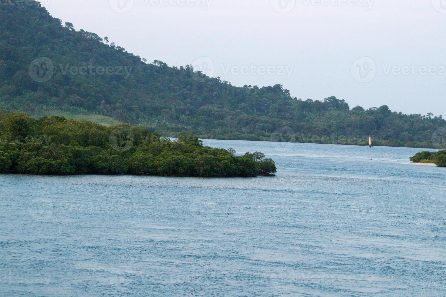 Landscape view between the sky and the vast sea, located at Sunda Strait, Lampung, Indonesia photo