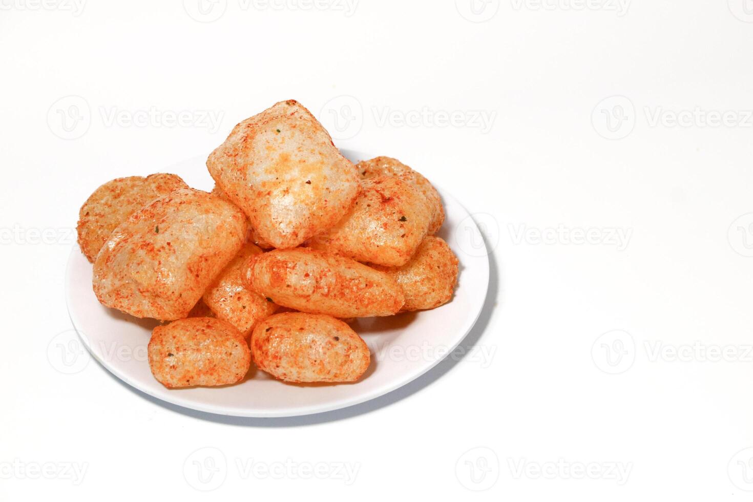 Kerupuk kulit,rambak, jangek, krecek, karodok, are a traditional Indonesian snack made from cow or sheep skin, with a spicy taste. photo