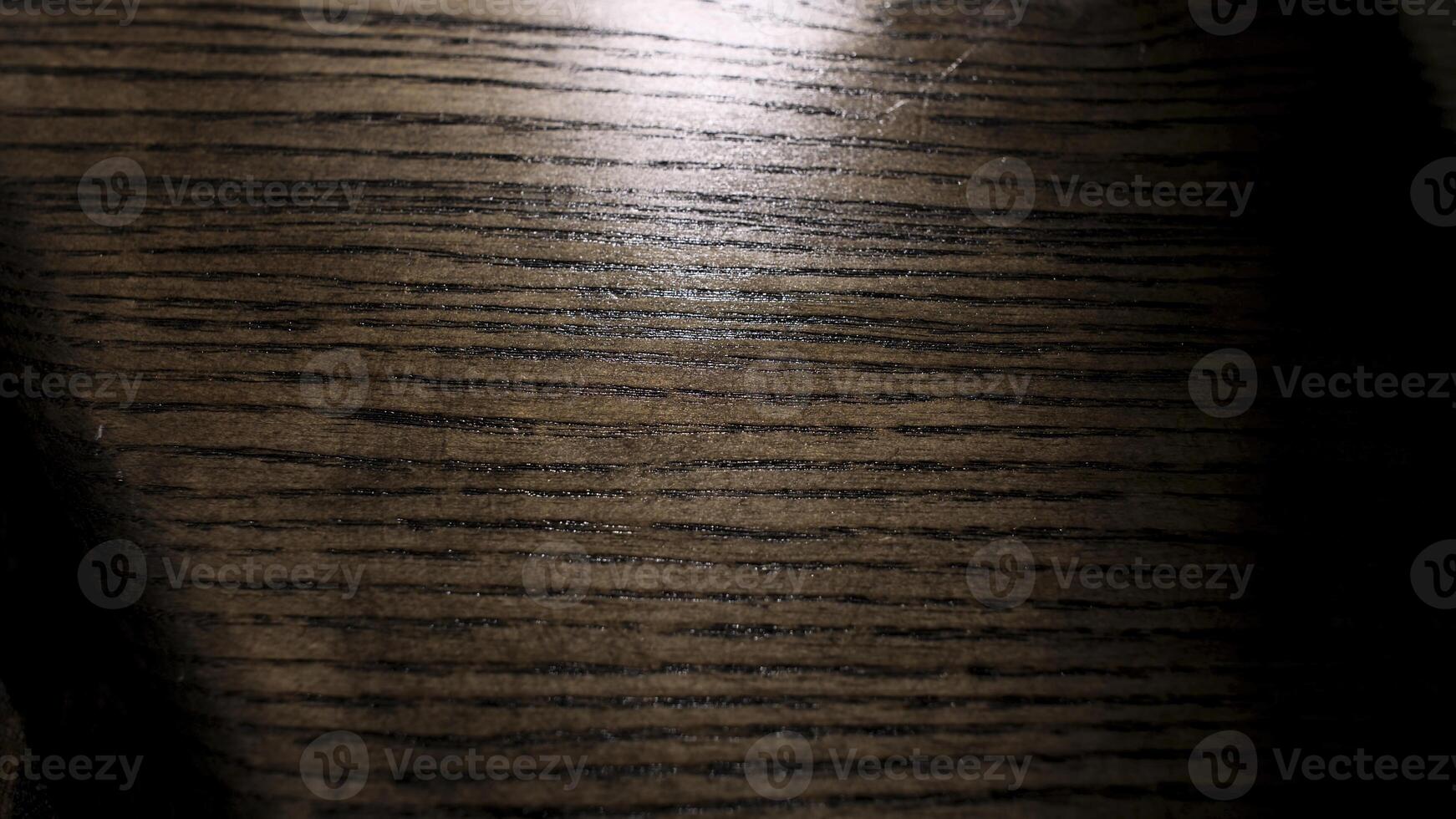 Male hand applying wood care products on a wooden bord with white cloth. Stock footage. Close up of wooden panel oiling process. photo