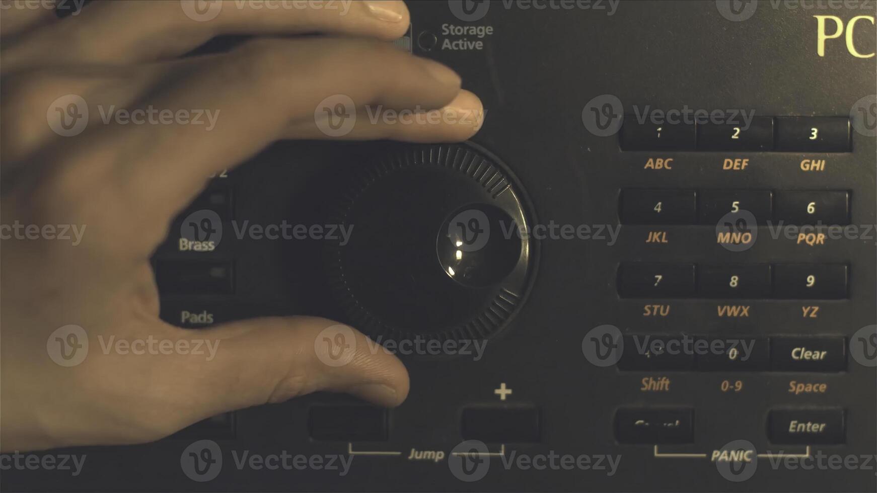 Hand tuning fm radio button. Retro image processed. Hand adjusting volume control. Broadcasting and music concept. woman turning button of radio in car. Woman hand adjusting volume control. photo