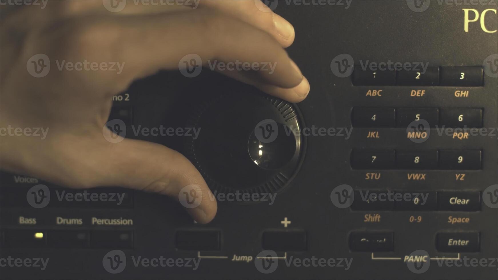 Hand tuning fm radio button. Retro image processed. Hand adjusting volume control. Broadcasting and music concept. woman turning button of radio in car. Woman hand adjusting volume control. photo