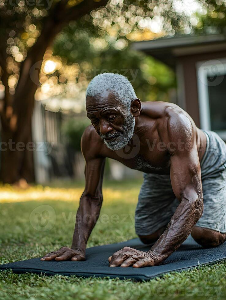 Elderly Man Performing Yoga in a Backyard photo