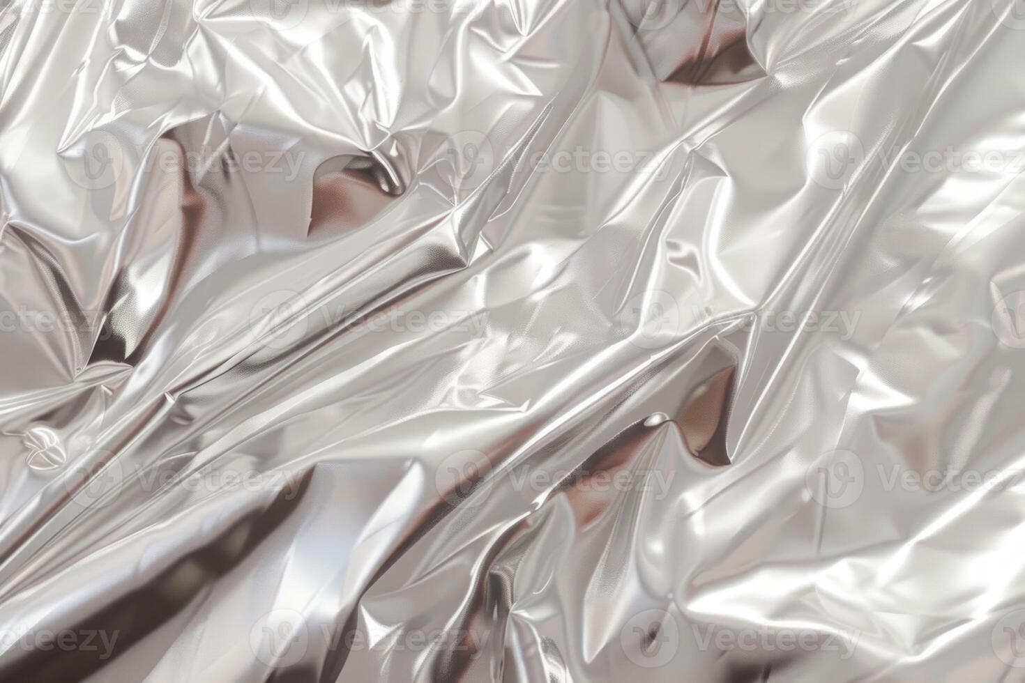 Silver foil with a patterned texture. Metallic background for design projects. photo