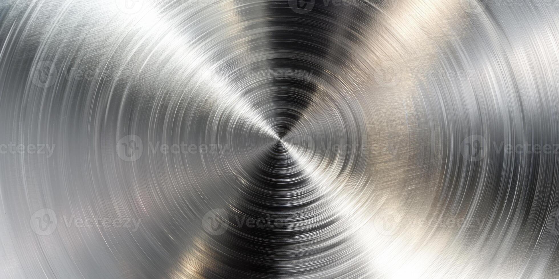 A silver object with a circular shape photo