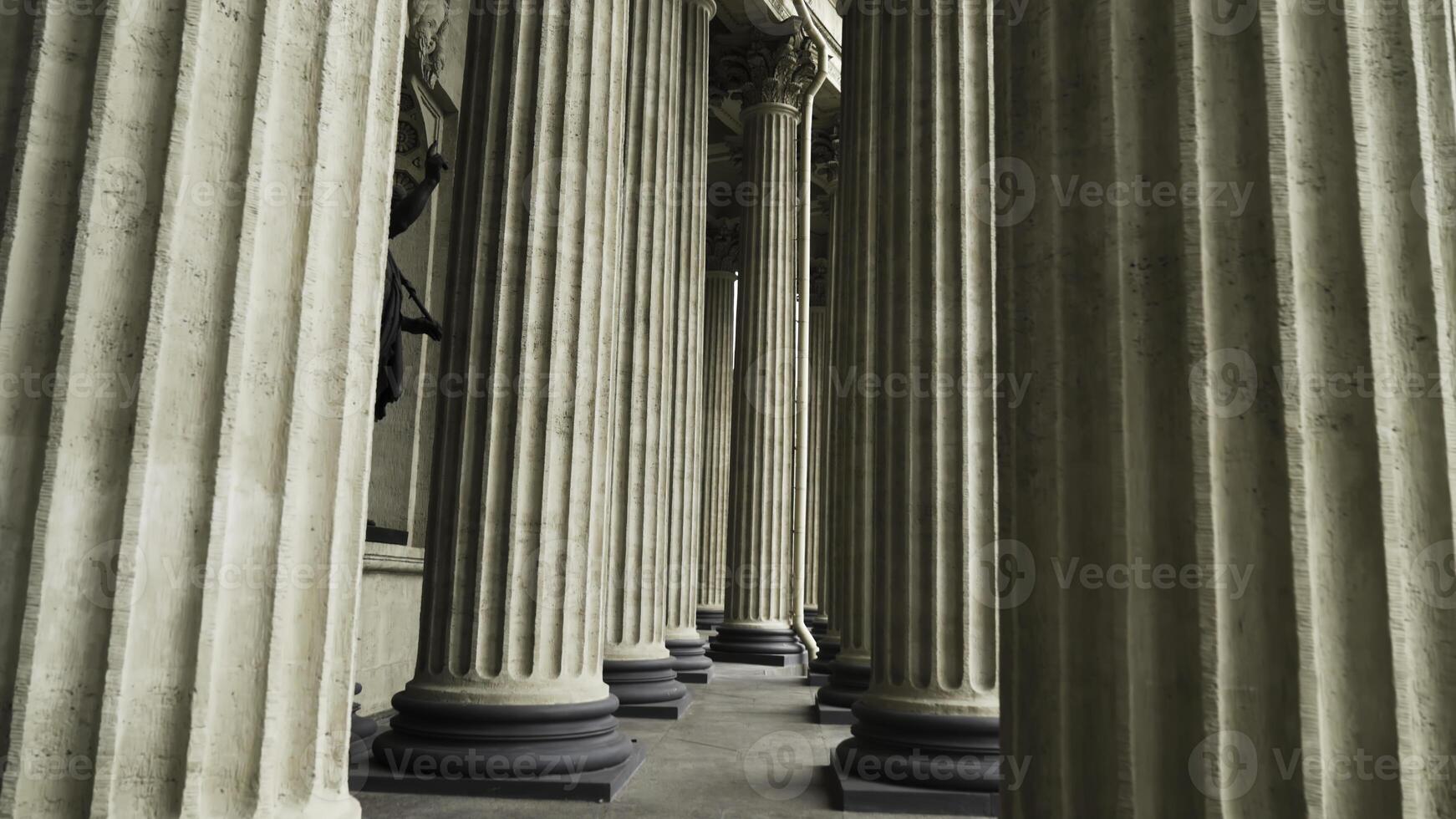 Corinthian columns of Kazan Cathedral, Saint-Petersburg, Russia. Action. Bottom view of the beautiful colonnade of Russian Orthodox Church, concept of architecture. photo