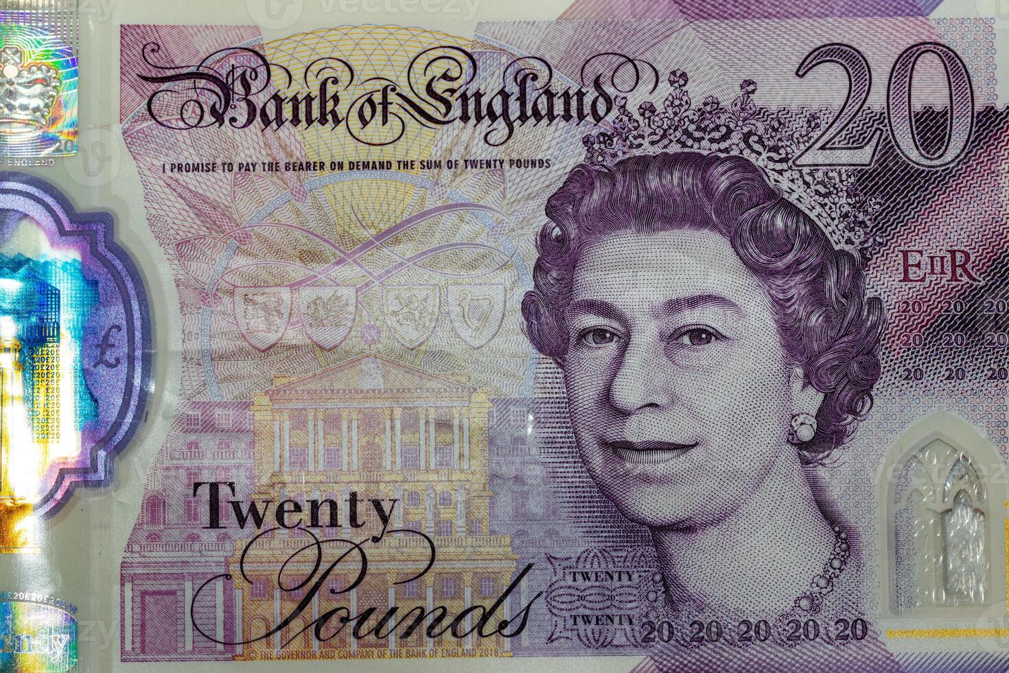 A twenty pound note with a portrait of queen elizabeth on it photo