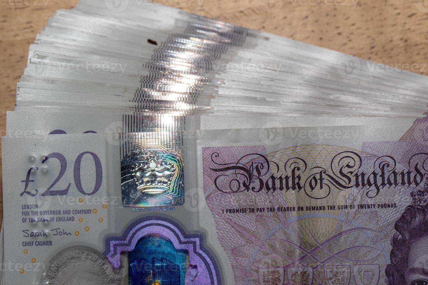 A stack of british pound notes photo