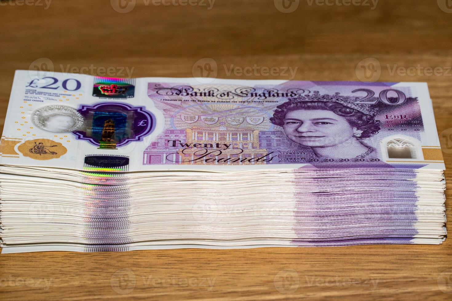 A stack of british pound notes photo