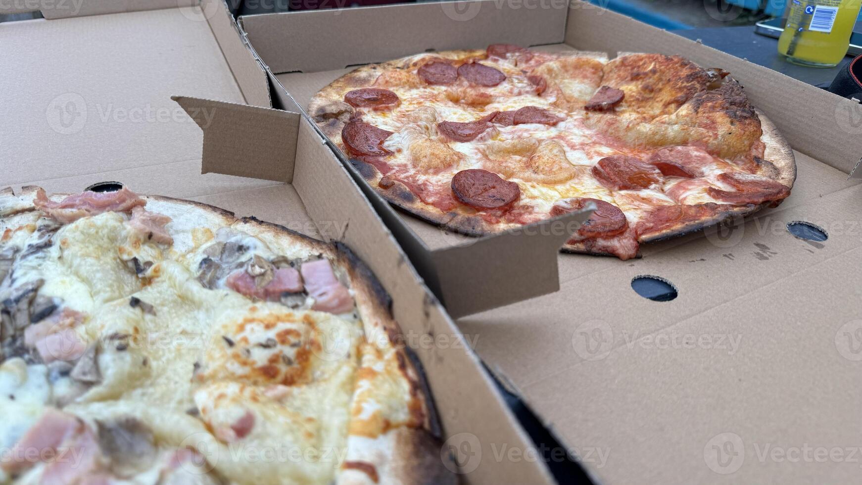Two Delicious Pizzas in a Box photo