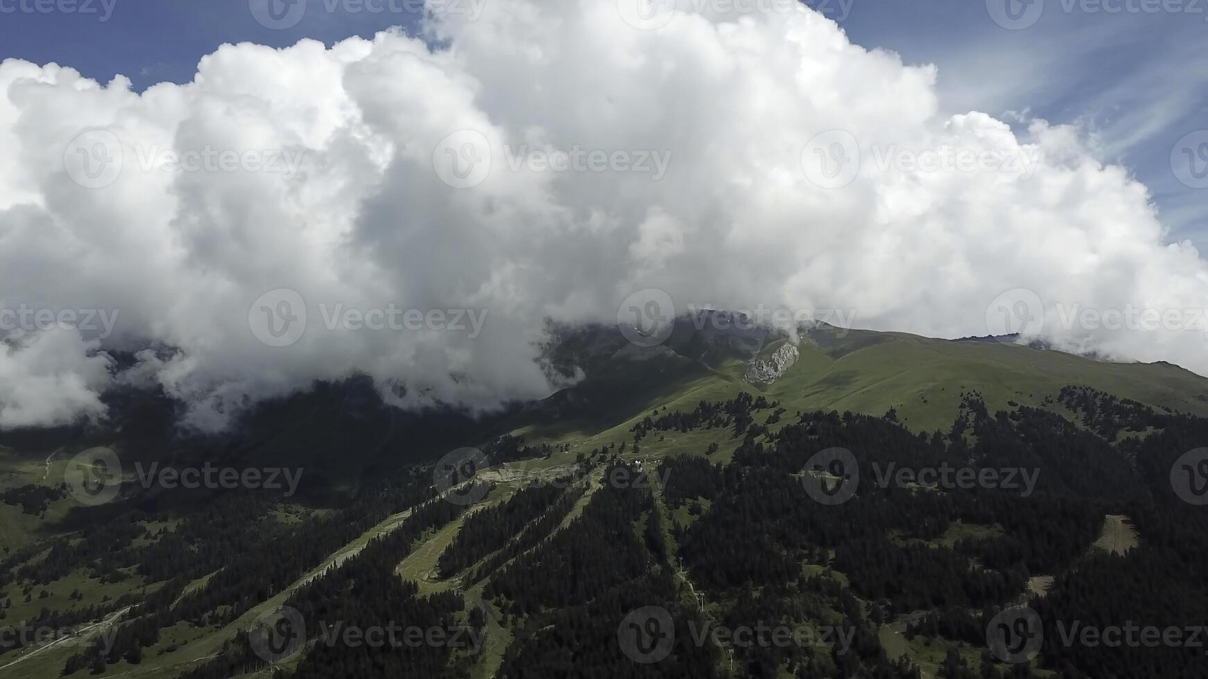 View of the Valley in early morning aerial view. Aerial view drone flying in the valley with pine tree forest in the mountain range photo