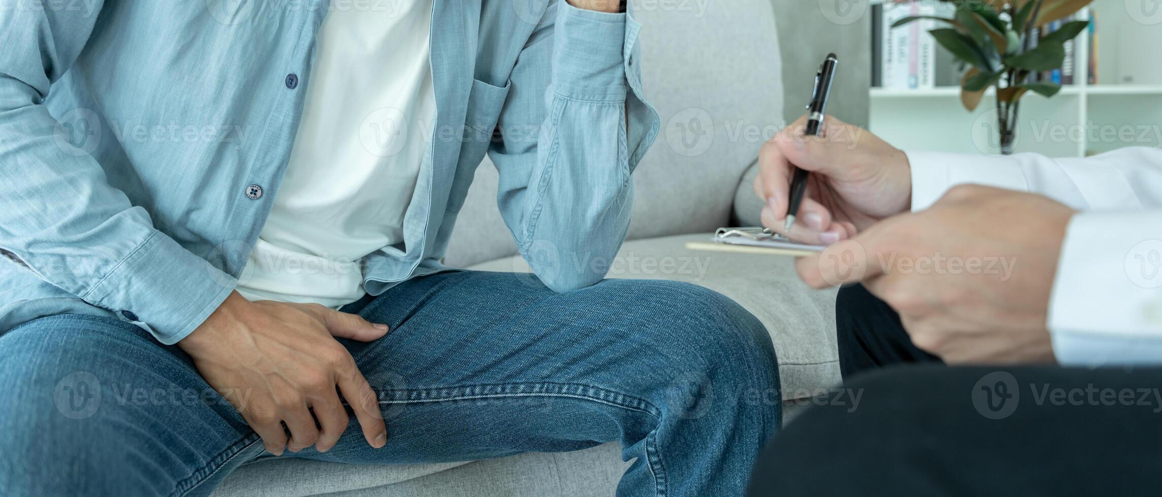 Man hold hand in front of private parts feeling discomfort and consult doctor. Venereal, testicular cancer. bladder problems, erectile dysfunction, premature ejaculation, prostate cancer photo
