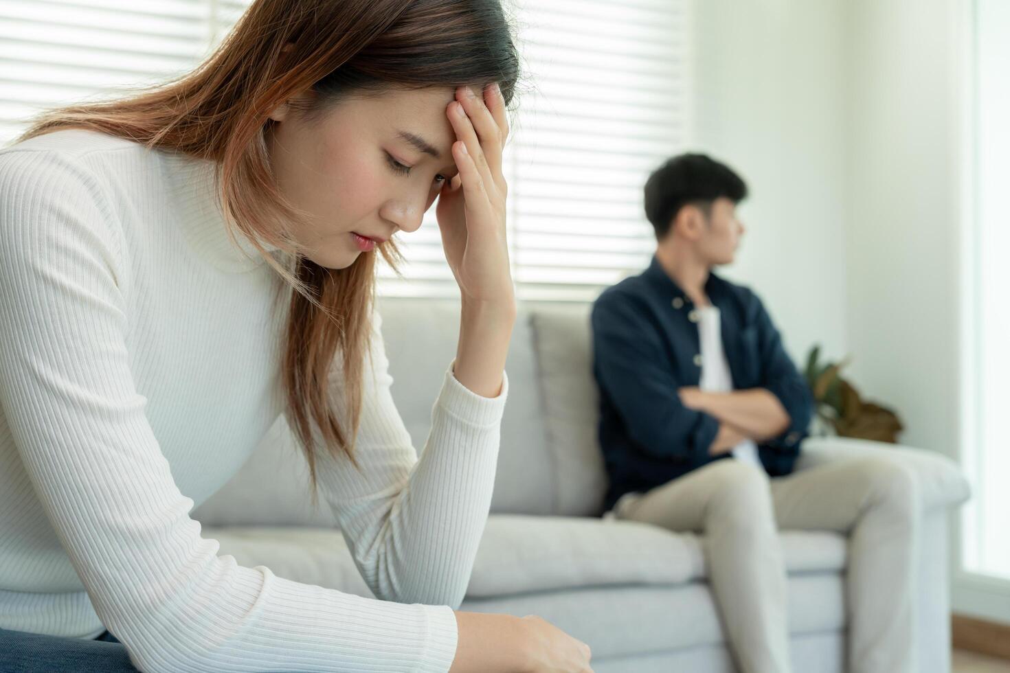 Divorce. Asian couples are desperate and disappointed after marriage. Husband and wife are sad, upset and frustrated after quarrels. distrust, love problems, betrayals. family problem, teenage love photo