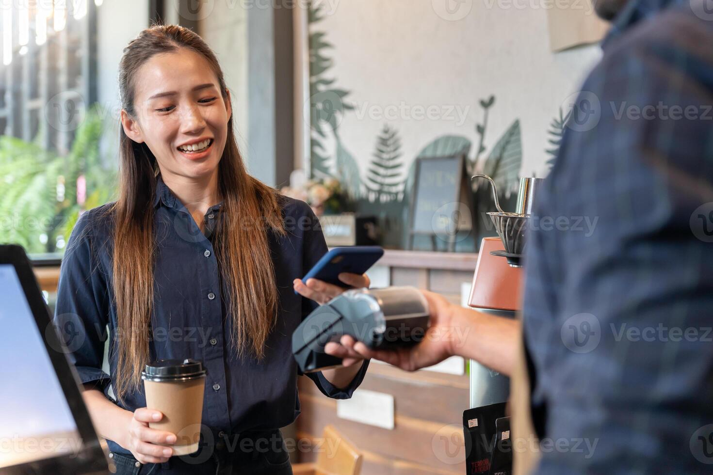 Woman use smartphone to scan QR code to pay in cafe restaurant with a digital payment without cash. Choose menu and order accumulate discount. E wallet, technology, pay online, credit card, bank app. photo
