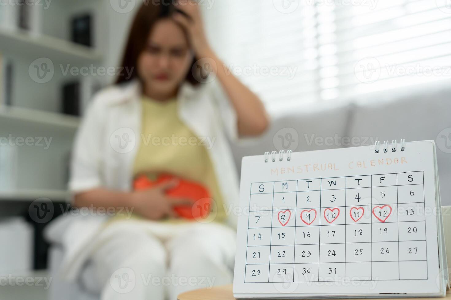 stomach ache. Asian women have abdominal pain, indigestion, gastritis, menstrual cramps, flatulence, diarrhea, distention, colon cancer, belly inflammation problem, suffer food poisoning, abdomen photo