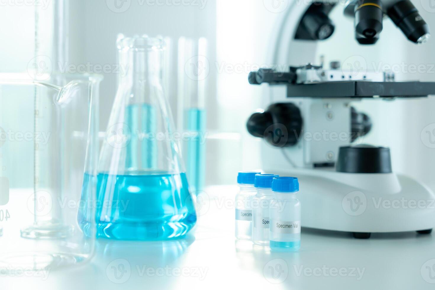 analyze biochemical samples in advanced scientific laboratory. Medical professional use microscope look microbiological developmental of viral. Biotechnology research in science lab. photo