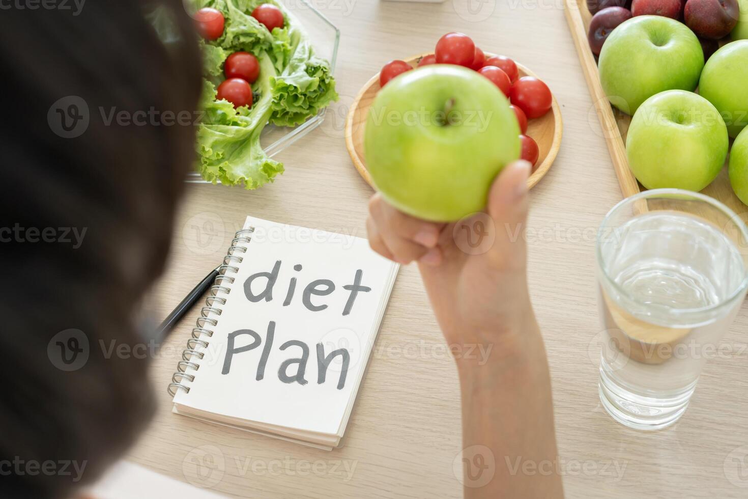 Diet and dieting. Beauty slim female body writing diet plan for healthy food. weight loss, lose, balance, control, reduce fat, low calories, routines, exercise. photo