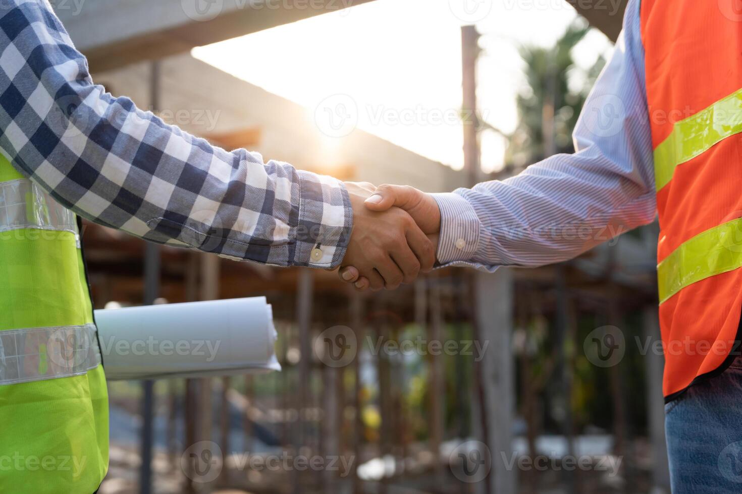 Construction team hands shaking greeting start up plan new project contract in office center at construction site, industry ,architecture, partner, teamwork, agreement, property, contacts. photo