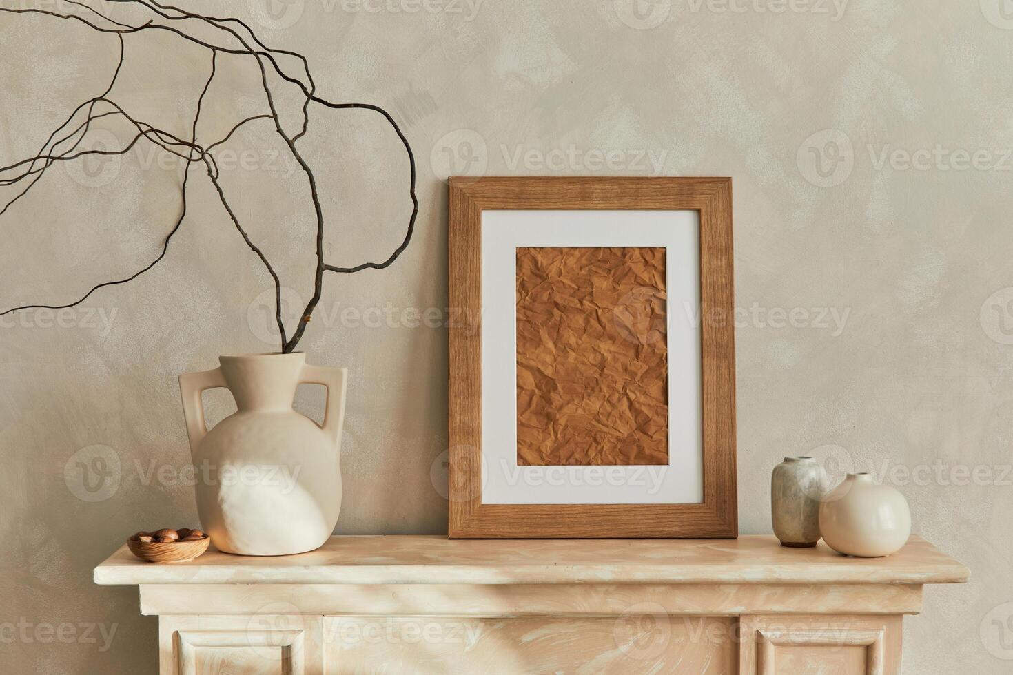 Minimalistic composition of living room interior with wooden mpck up poster frame, design elegant vases and personal accessories. Neutral colors. Template. photo