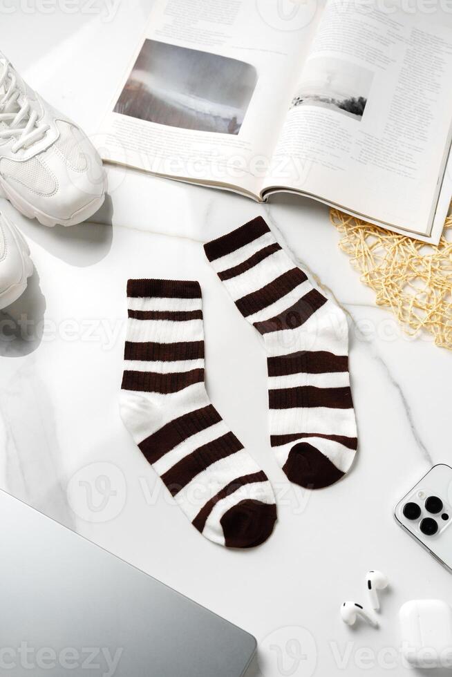 Composition with stylish socks on white background photo