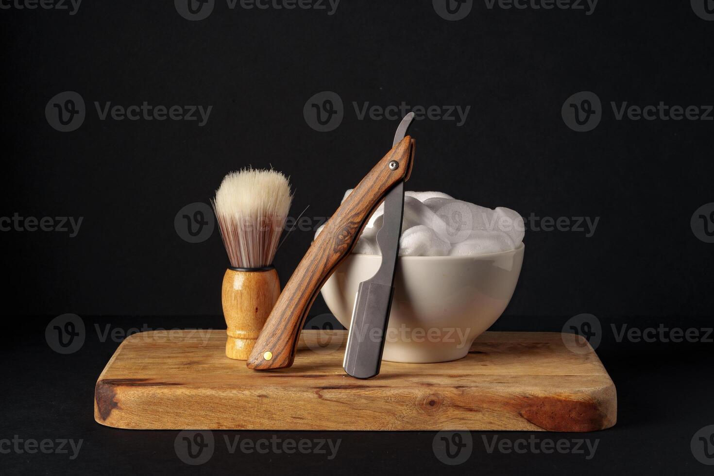 Classic Shaving Equipment With Razor, Brush, and Soap on Wooden Stand Against Dark Background photo