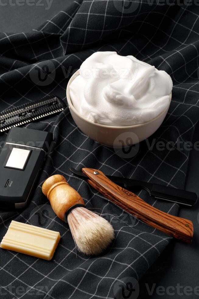 Traditional Wet Shaving Gear Arranged on a Dark Background With Morning Light photo