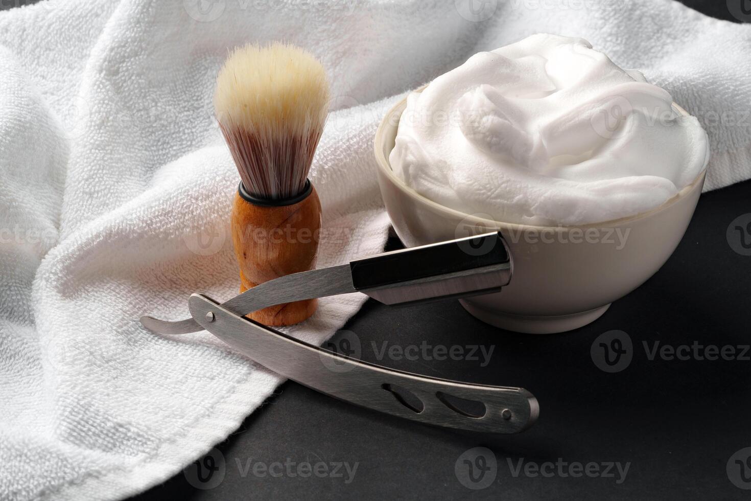 Traditional Wet Shaving Gear Arranged on a Dark Background With Morning Light photo