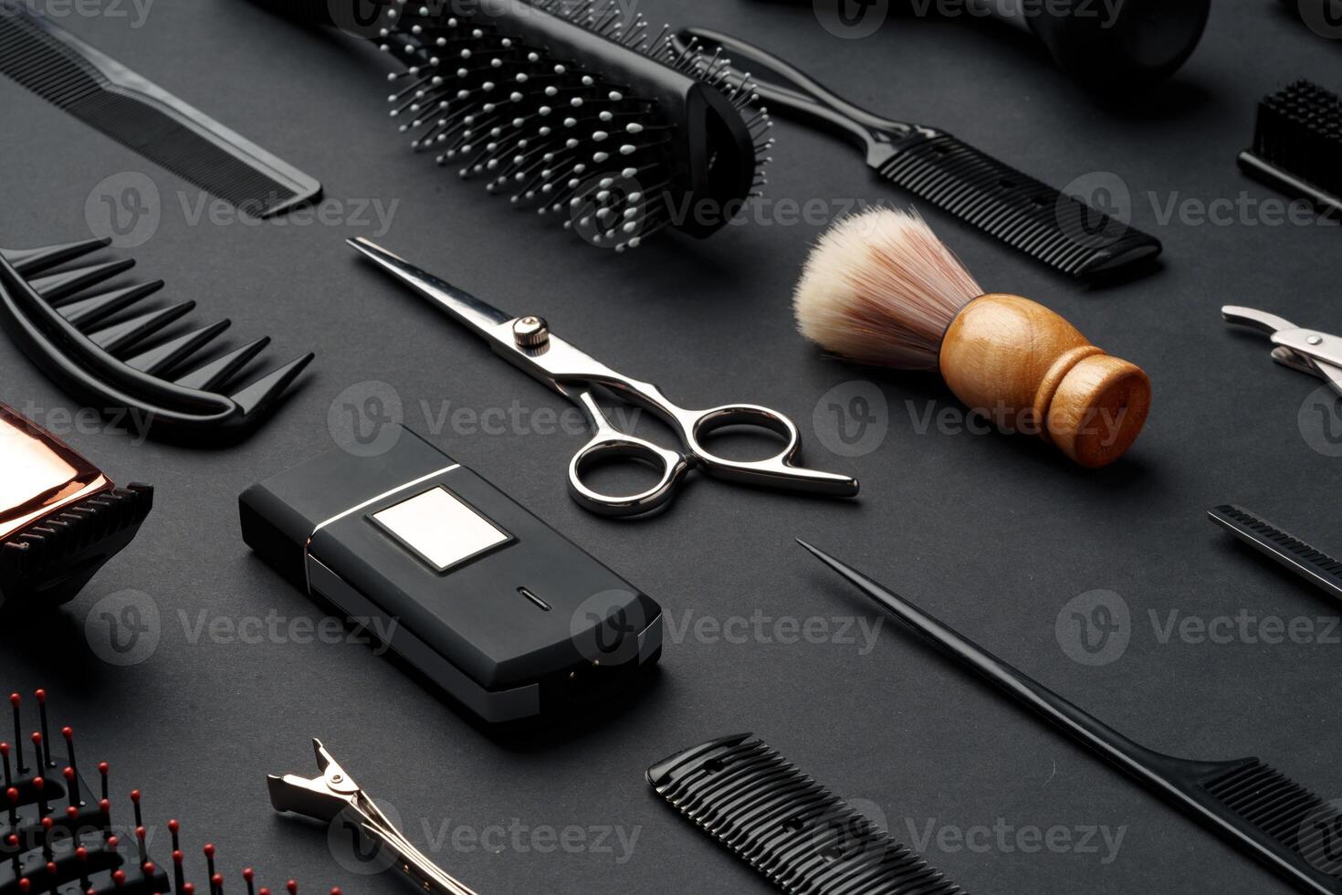 Variety of Hair Styling Tools and Accessories Displayed on a Dark Background photo